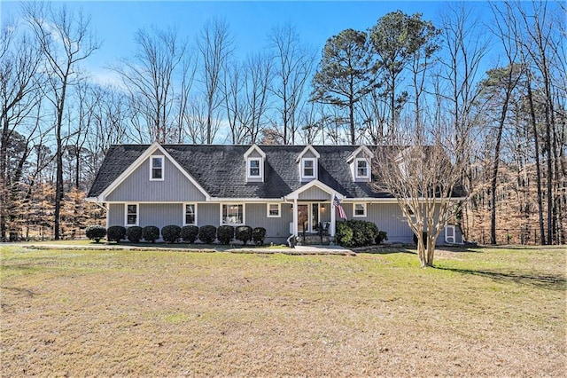 new england style home with a front yard