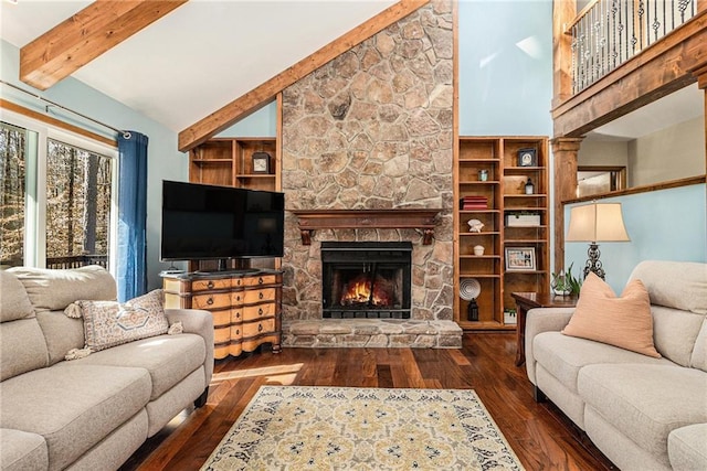 living area with high vaulted ceiling, dark wood finished floors, beam ceiling, and a stone fireplace