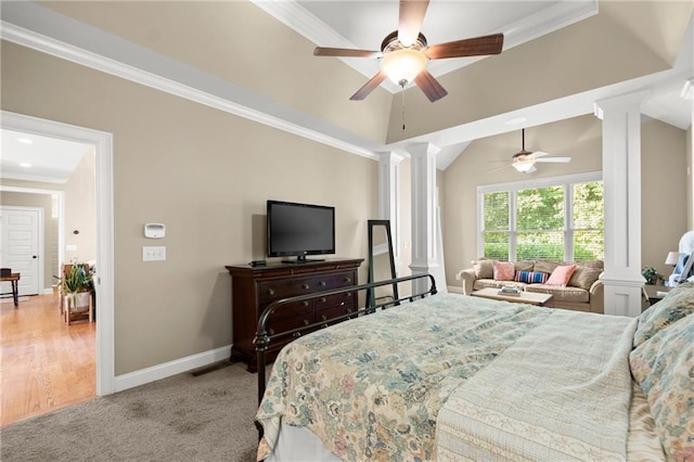 bedroom featuring baseboards, carpet floors, crown molding, and ornate columns