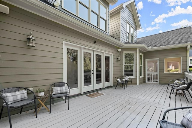 wooden deck featuring french doors