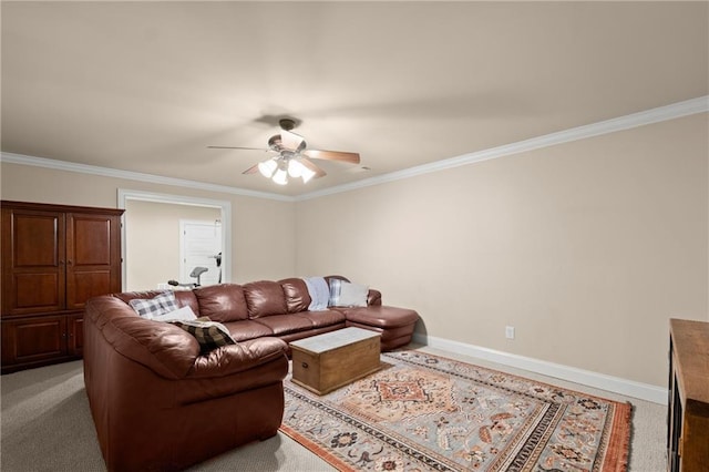 living room with light colored carpet, ceiling fan, baseboards, and crown molding