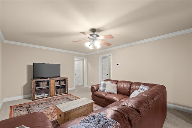living room with carpet floors, baseboards, and ceiling fan