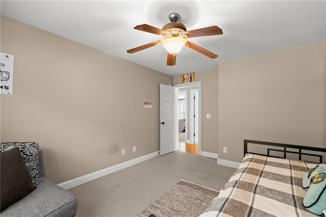 bedroom with baseboards, carpet, and ceiling fan