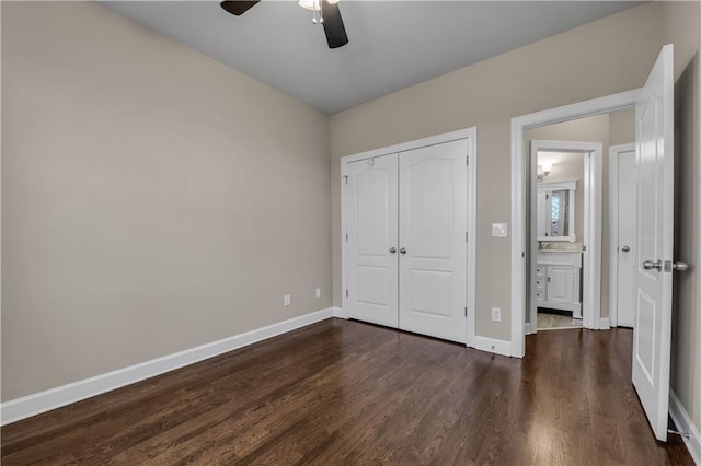 unfurnished bedroom featuring a closet, ceiling fan, and dark hardwood / wood-style floors