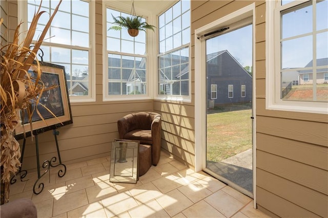 sunroom featuring a healthy amount of sunlight