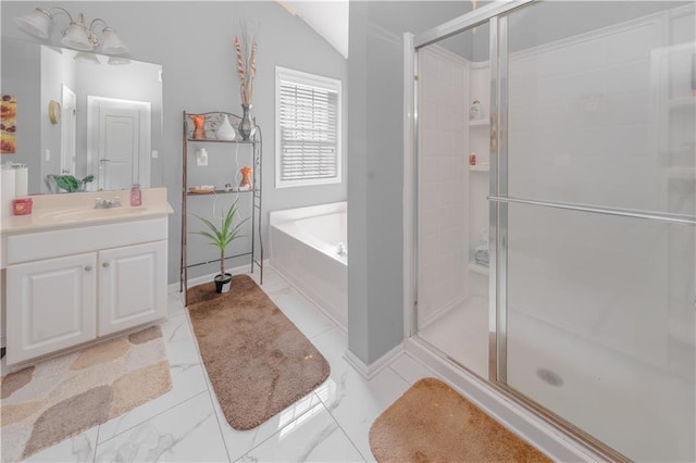 bathroom with marble finish floor, a shower stall, and a bath