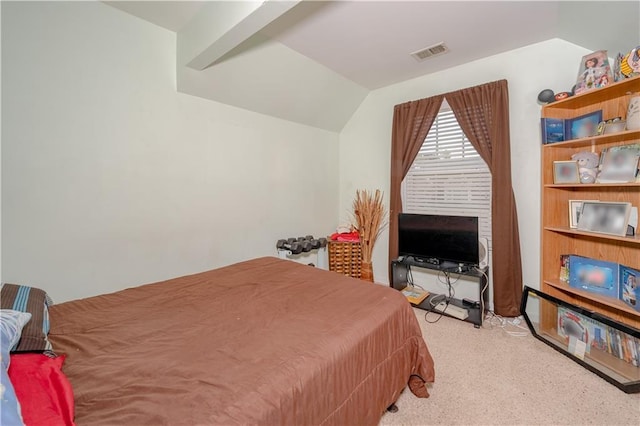 carpeted bedroom with lofted ceiling and visible vents