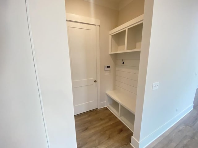 mudroom with light wood-type flooring and baseboards