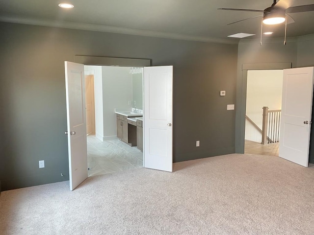 empty room featuring recessed lighting, ceiling fan, ornamental molding, and light colored carpet