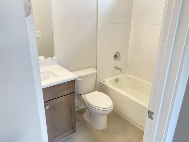 bathroom with washtub / shower combination, vanity, toilet, and tile patterned floors