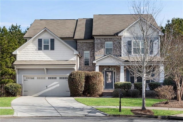 view of front facade featuring a garage, brick siding, concrete driveway, and a front yard