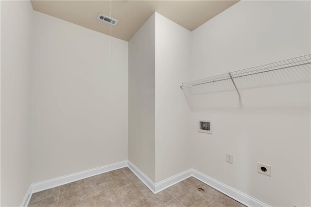 laundry room featuring visible vents, baseboards, hookup for an electric dryer, hookup for a washing machine, and laundry area