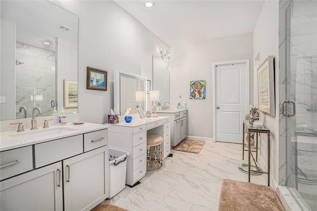 full bath featuring a sink, a marble finish shower, two vanities, and marble finish floor