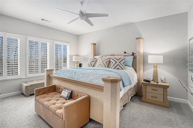 bedroom featuring baseboards, carpet floors, and visible vents