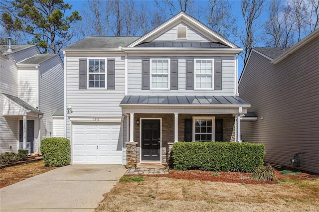 craftsman inspired home featuring a standing seam roof, metal roof, and covered porch