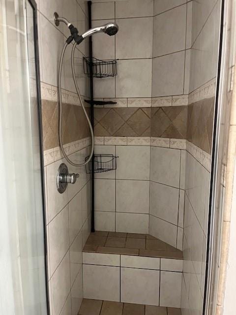 bathroom featuring a stall shower