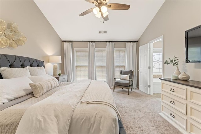 bedroom featuring lofted ceiling, a ceiling fan, visible vents, and light carpet