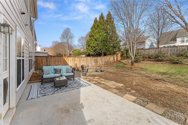 view of patio featuring a fenced backyard and outdoor lounge area