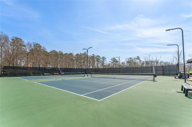 view of sport court with community basketball court and fence