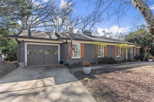 ranch-style house featuring a garage