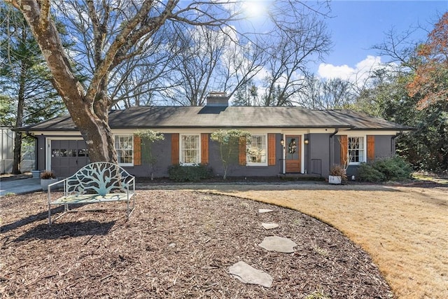 single story home featuring a garage