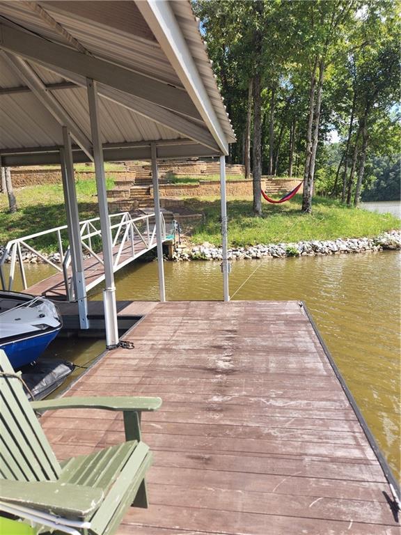 dock area featuring a water view