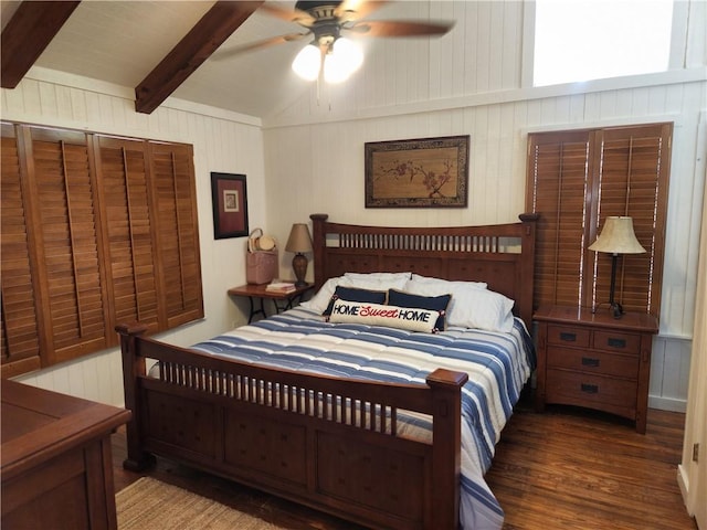 bedroom with beamed ceiling, dark hardwood / wood-style flooring, and ceiling fan