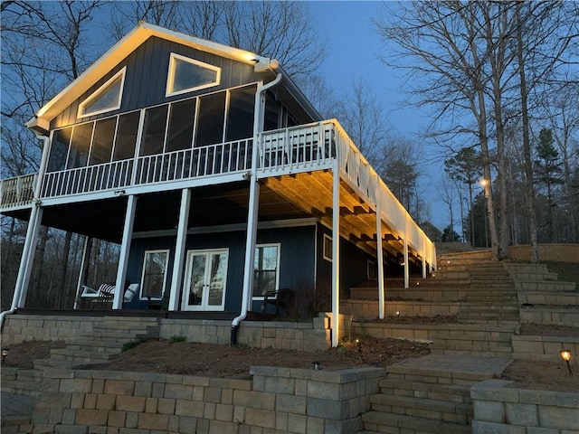 exterior space featuring a sunroom