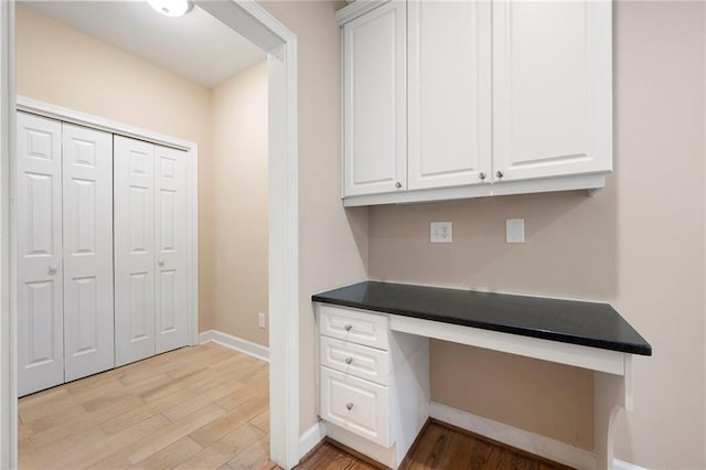 4957 Day Lily Way NW, Acworth, GA 30102 - unfurnished office with built in desk, light wood-style floors, and baseboards