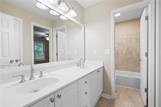4957 Day Lily Way NW, Acworth, GA 30102 - bathroom with double vanity, baseboards, and ceiling fan