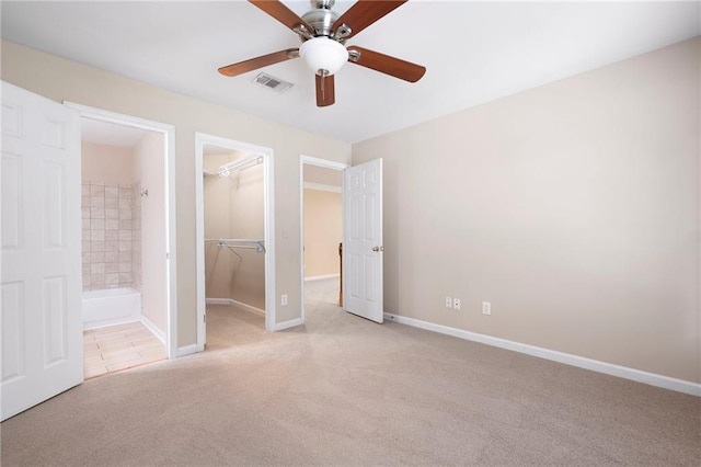 4957 Day Lily Way NW, Acworth, GA 30102 - unfurnished bedroom with carpet floors, a spacious closet, ensuite bath, a closet, and baseboards