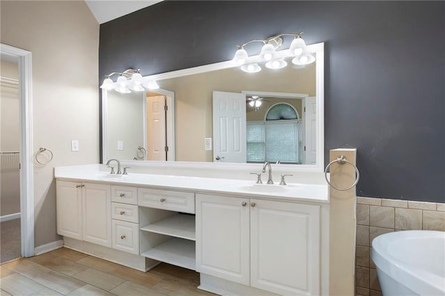 4957 Day Lily Way NW, Acworth, GA 30102 - full bath featuring double vanity, a walk in closet, and a bathtub