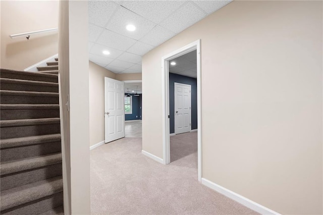 4957 Day Lily Way NW, Acworth, GA 30102 - hall with stairway, recessed lighting, light carpet, baseboards, and a paneled ceiling