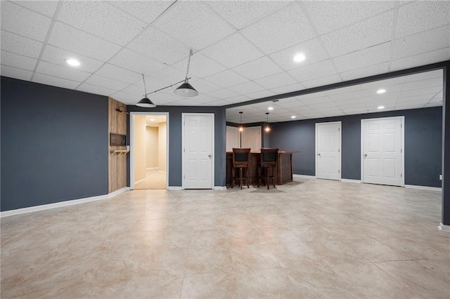 4957 Day Lily Way NW, Acworth, GA 30102 - living area with bar area, baseboards, a drop ceiling, and recessed lighting