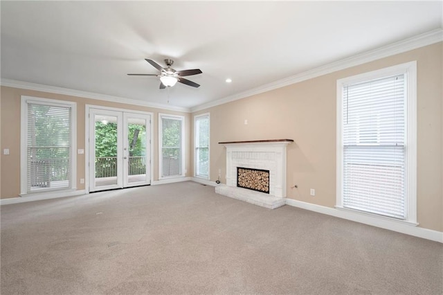 4957 Day Lily Way NW, Acworth, GA 30102 - unfurnished living room with crown molding, a ceiling fan, light colored carpet, and baseboards