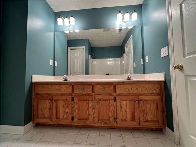 hall with baseboards, wood finished floors, and an upstairs landing