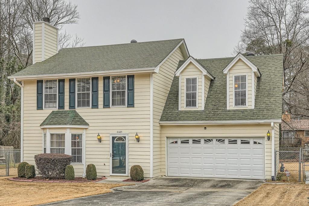 view of front of home with a garage