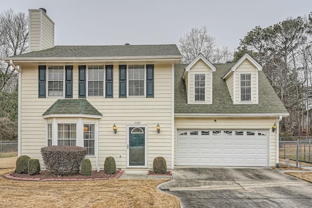 view of front of home with a garage