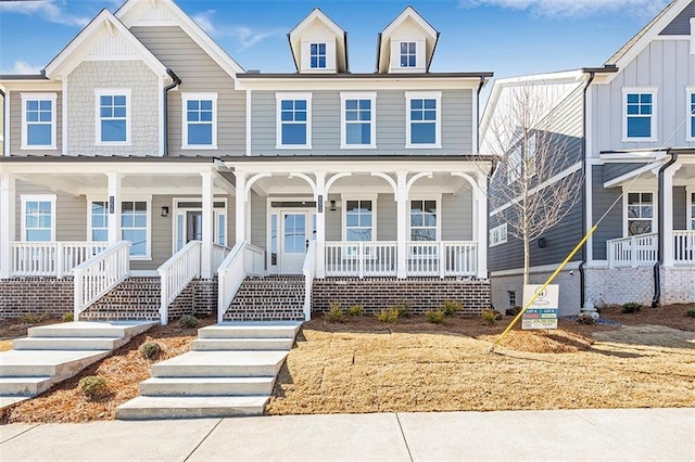 multi unit property featuring covered porch