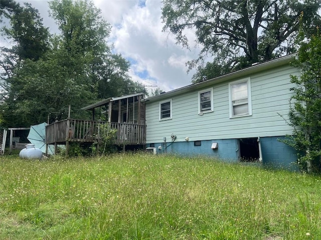 2096 Boar Tusk Rd NE, Conyers, GA 30012 - back of property featuring a deck