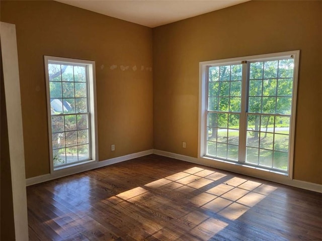 164 Mcclain Cir, Macon, GA 31216 - empty room featuring dark wood-style floors and baseboards
