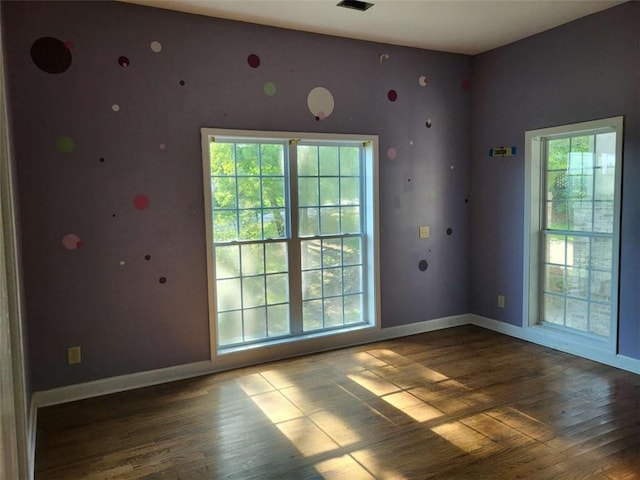 164 Mcclain Cir, Macon, GA 31216 - unfurnished room featuring baseboards and wood finished floors