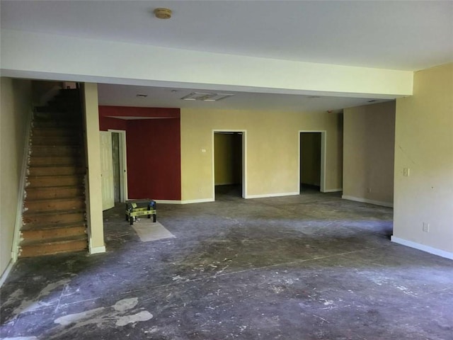 164 Mcclain Cir, Macon, GA 31216 - unfurnished living room featuring baseboards and stairway