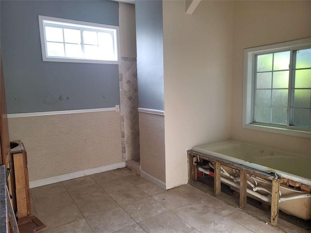 164 Mcclain Cir, Macon, GA 31216 - full bath with a garden tub and a wainscoted wall