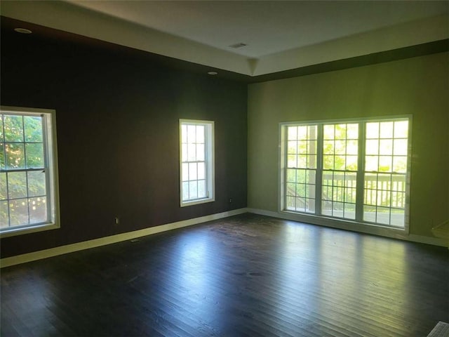 164 Mcclain Cir, Macon, GA 31216 - spare room featuring dark wood-style flooring