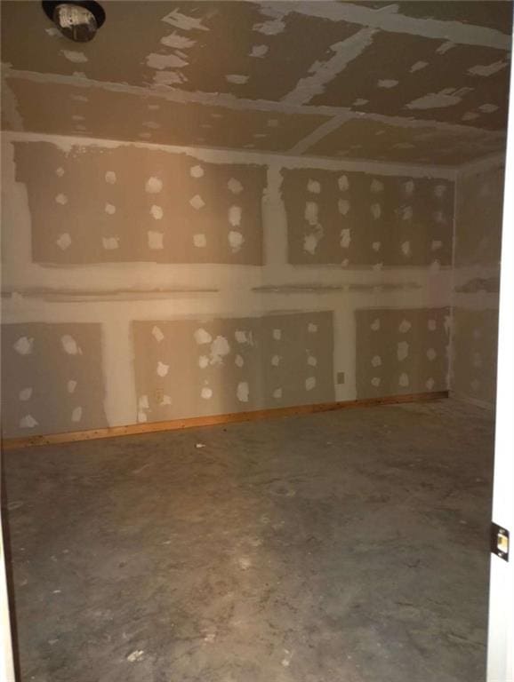 164 Mcclain Cir, Macon, GA 31216 - spare room featuring concrete floors