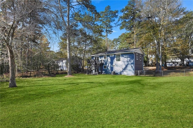 view of yard with a wooden deck