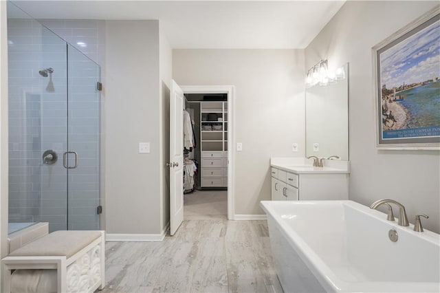 bathroom with vanity and plus walk in shower