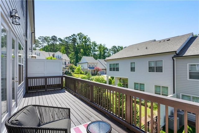 wooden deck featuring central AC