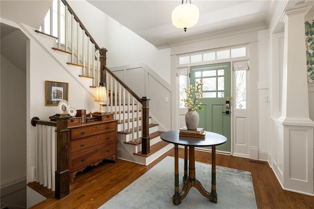 foyer entrance featuring dark hardwood / wood-style flooring